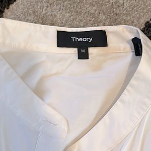 Long shirt; one pocket left breast; no snags, pulls or stains